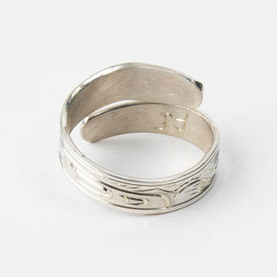 Hand carved 14k gold and silver eagle wrap ring with mountains carved by Indigenous Canadian Artist Agnes Seaweed Wisden