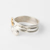 Hand carved 14k gold and silver raven wrap ring with mountains carved by Indigenous Canadian Artist Agnes Seaweed Wisden