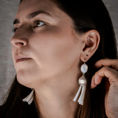 Madel Wearing Earrings