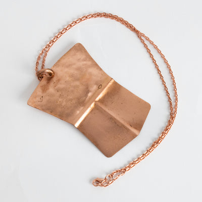 Copper shield pendant with chain