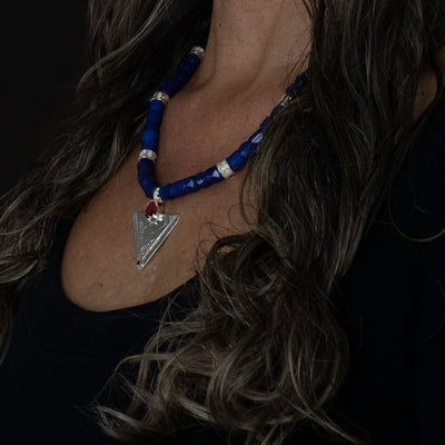 Hand Carved Sterling Silver Hummingbird Necklace made in BC | With blue Russian Trade beads | By Indigenous Female artist | Worn by local model