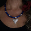 Hand Carved Sterling Silver Hummingbird Necklace made in BC | With blue Russian Trade beads | By Indigenous Female artist | Worn by local model