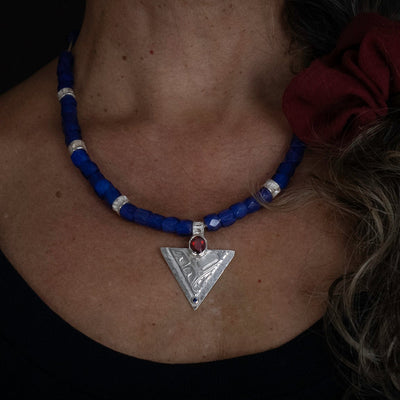 Hand Carved Sterling Silver Hummingbird Necklace made in BC | With blue Russian Trade beads | By Indigenous Female artist | Worn by local model