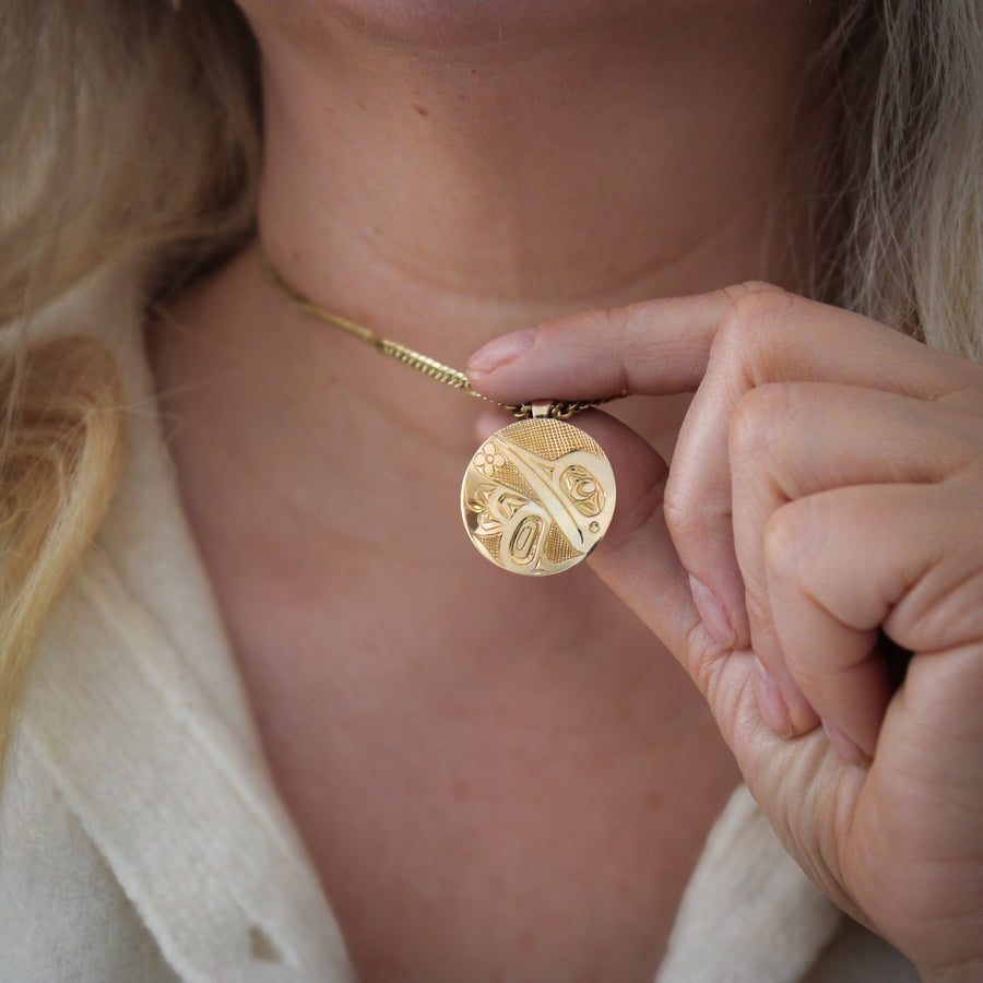 Round Yellow Gold Haida Hummingbird Pendant with Flower by J. Sawyer